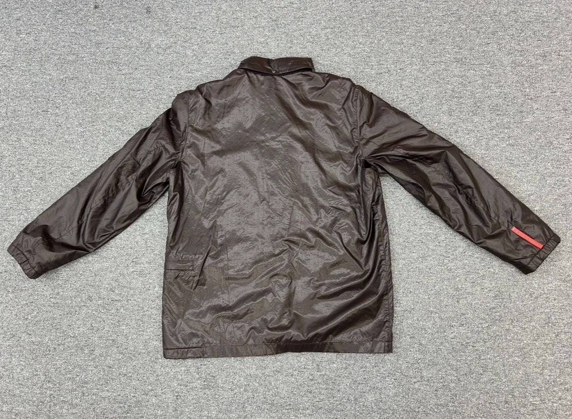 【美品】PRADA SPORTS ブルゾンジャケット 裏地総ロゴ XL ブラウン 中古】PRADA SPORT プラダスポーツ ナイロン ジャケット フード付き