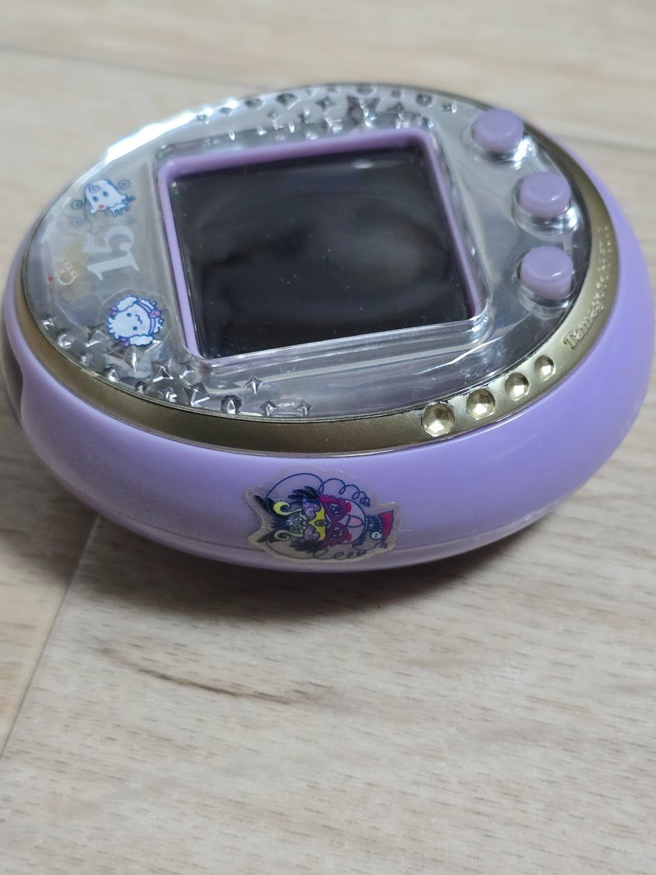 たまごっちiDL 15周年アニバーサリーモデル ロイヤルパープル - メルカリ