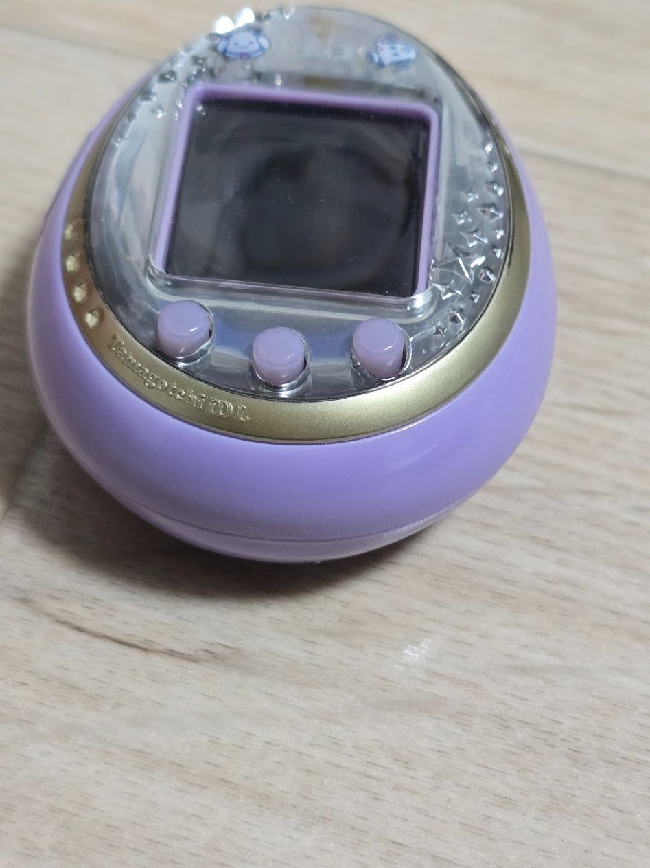 たまごっちiDL 15周年アニバーサリーモデル ロイヤルパープル - メルカリ