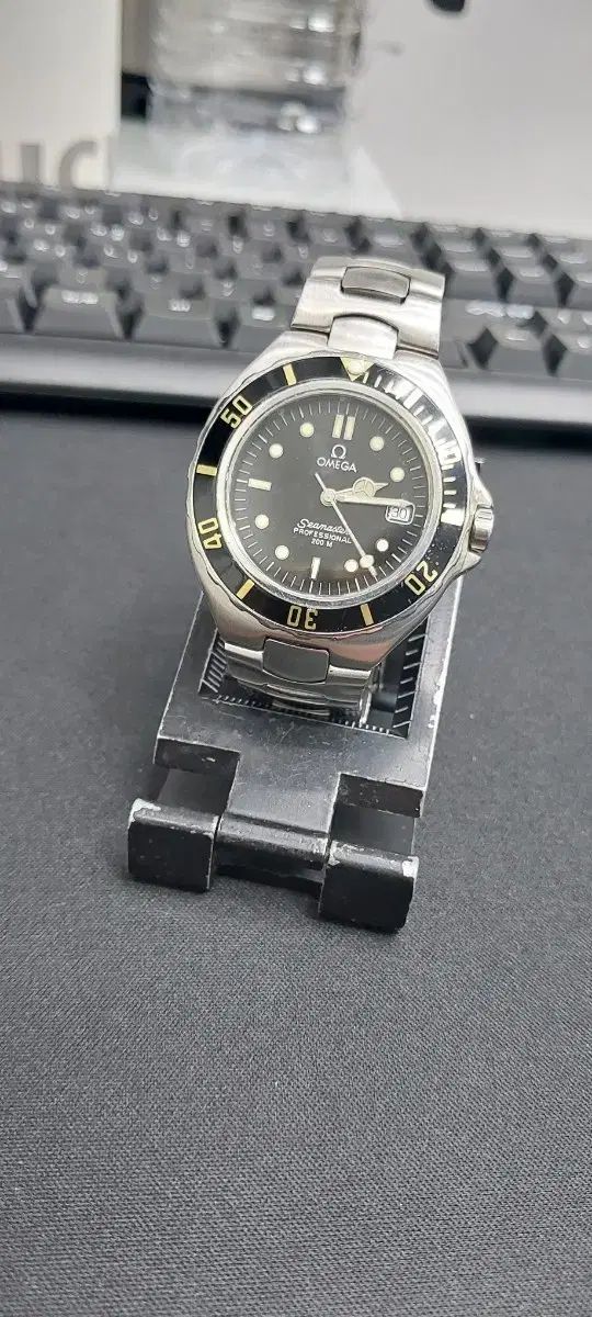 オメガ プロフェッショナル シーマスター 200 クオーツ 傷なし