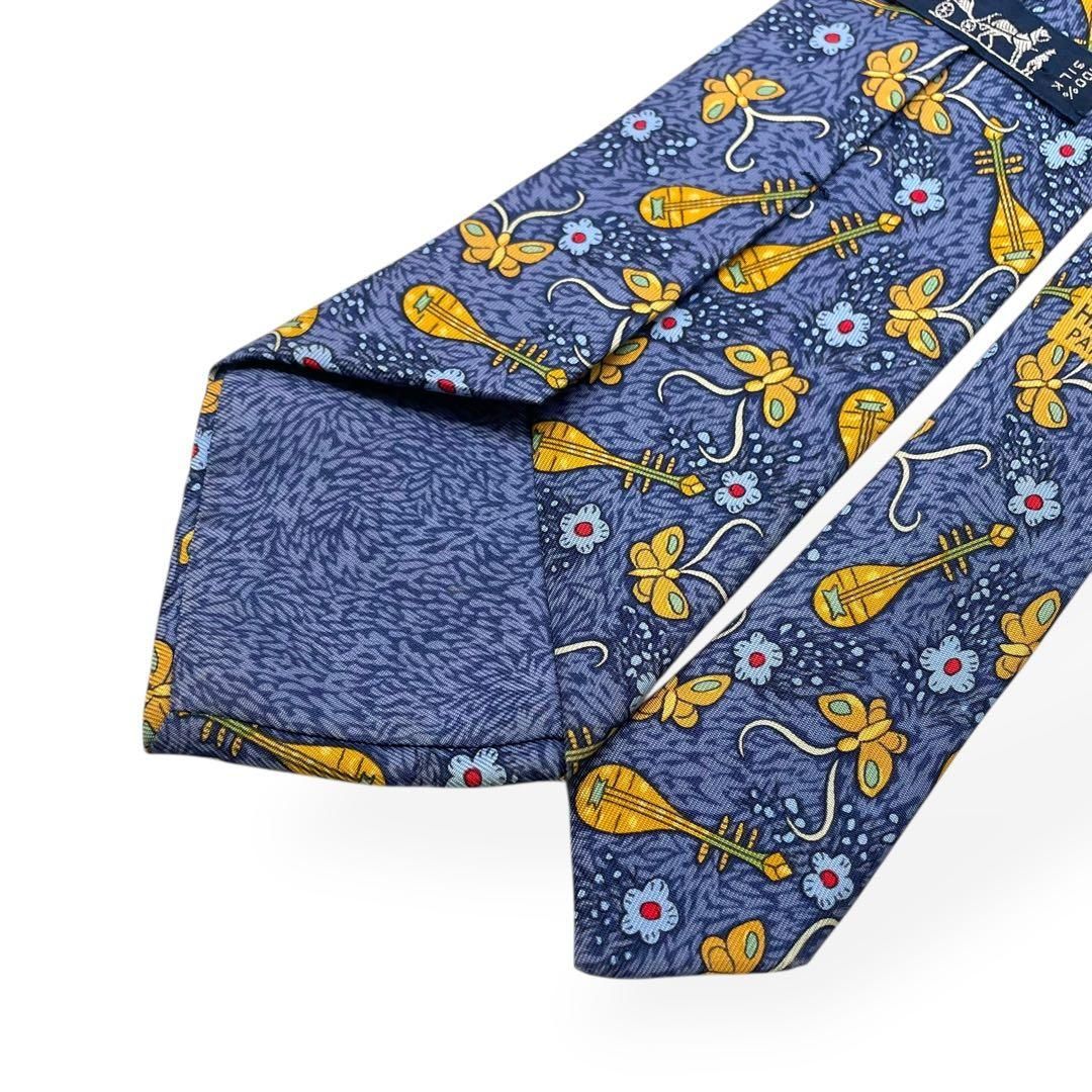 【美品】エルメス ネクタイ シルク100% スター柄 ブルー系 極美品 HERMES エルメス ネクタイ ブルー 総柄 楽器 蝶 シルク100