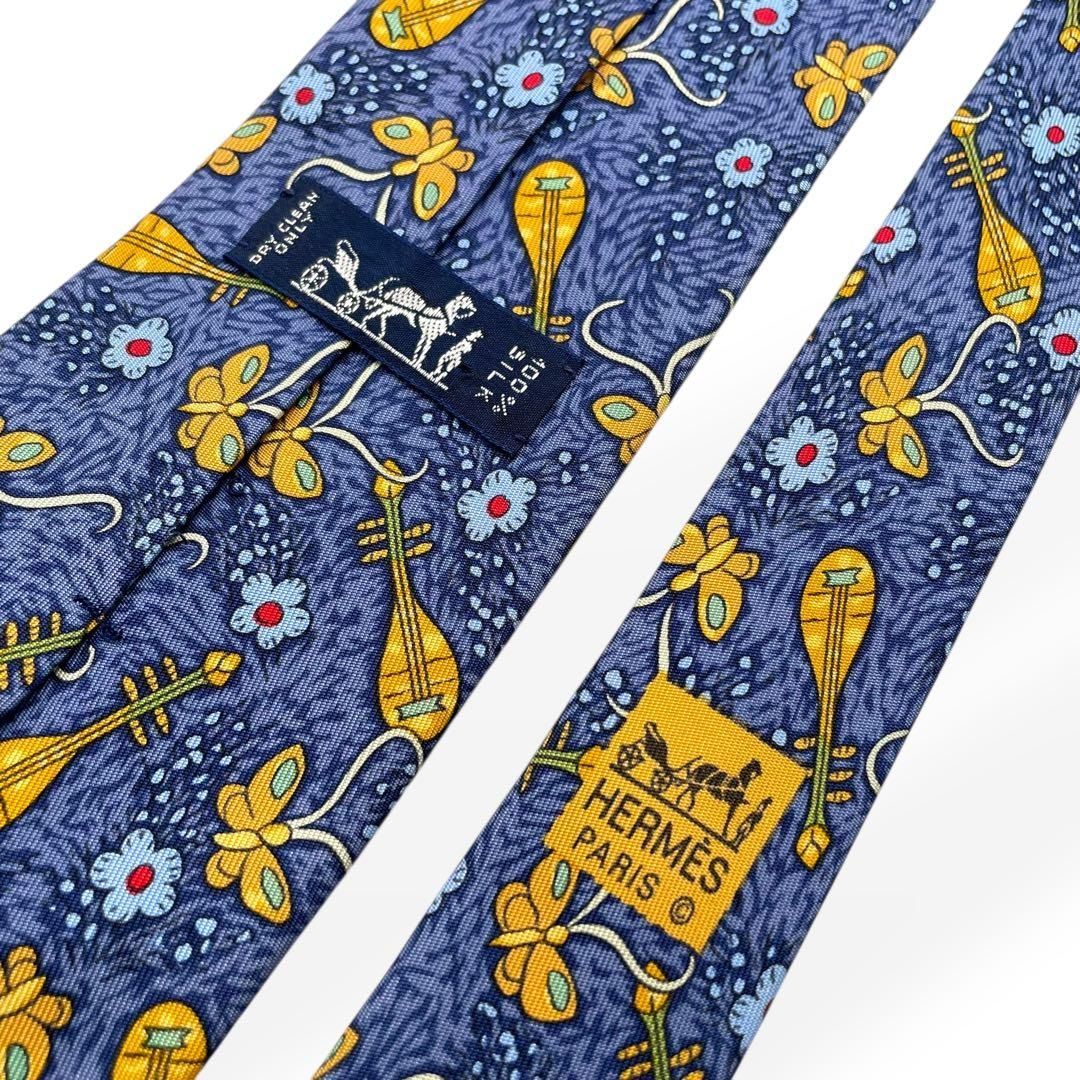 極美品 HERMES エルメス ネクタイ ブルー 総柄 楽器 蝶 シルク100