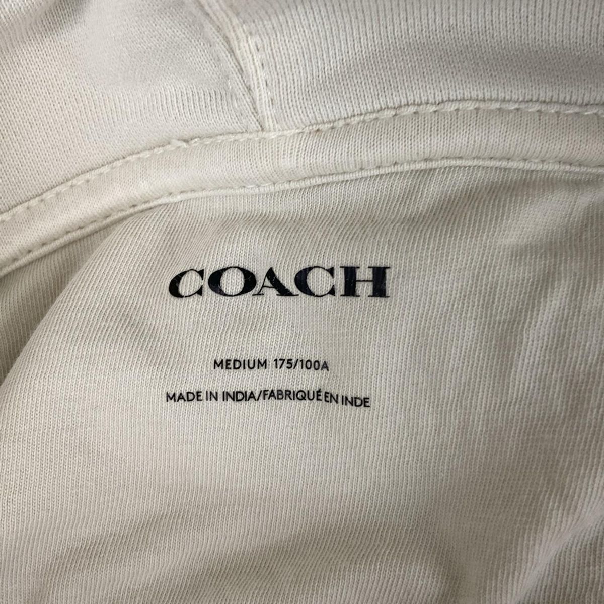 COACH(コーチ) パーカー サイズMEDIUM M メンズ美品 - アイボリー 長袖