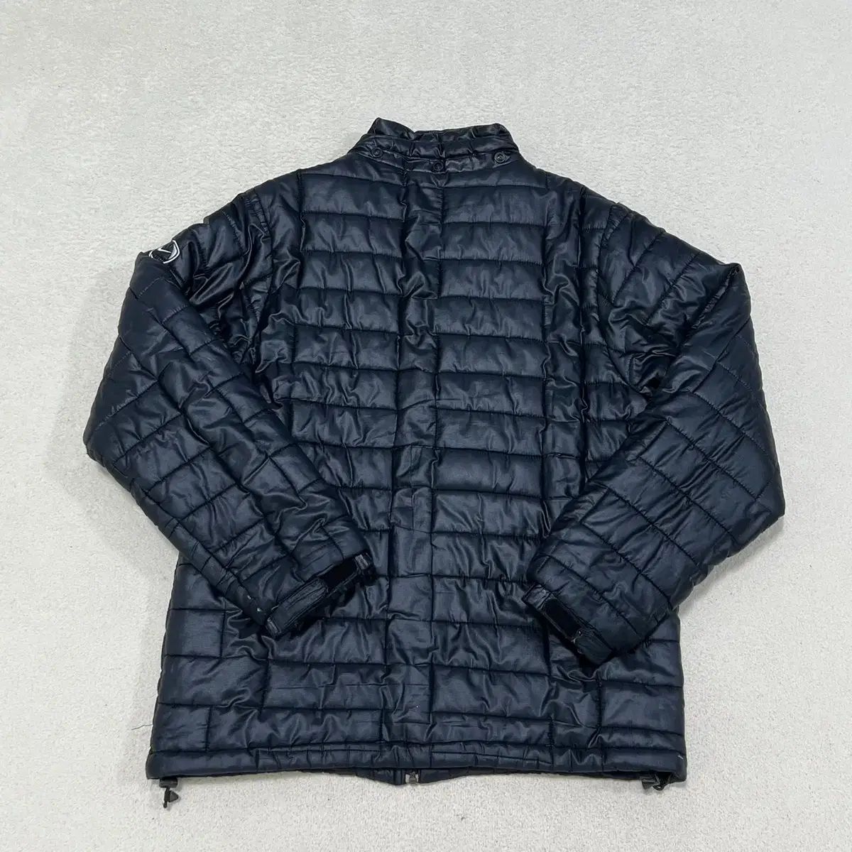 NIKE マンチェスターユナイテッド ダウンジャケット刺繍ロゴ　AIG マンチェスター・ユナイテッド ダウンジャケット - メルカリ