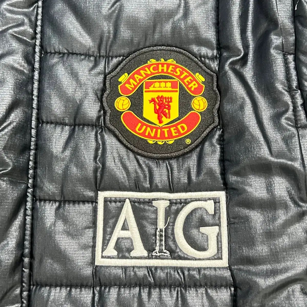 100 NIKE マンチェスター・ユナイテッド AIG 軽量ダウン 1104 - メルカリ