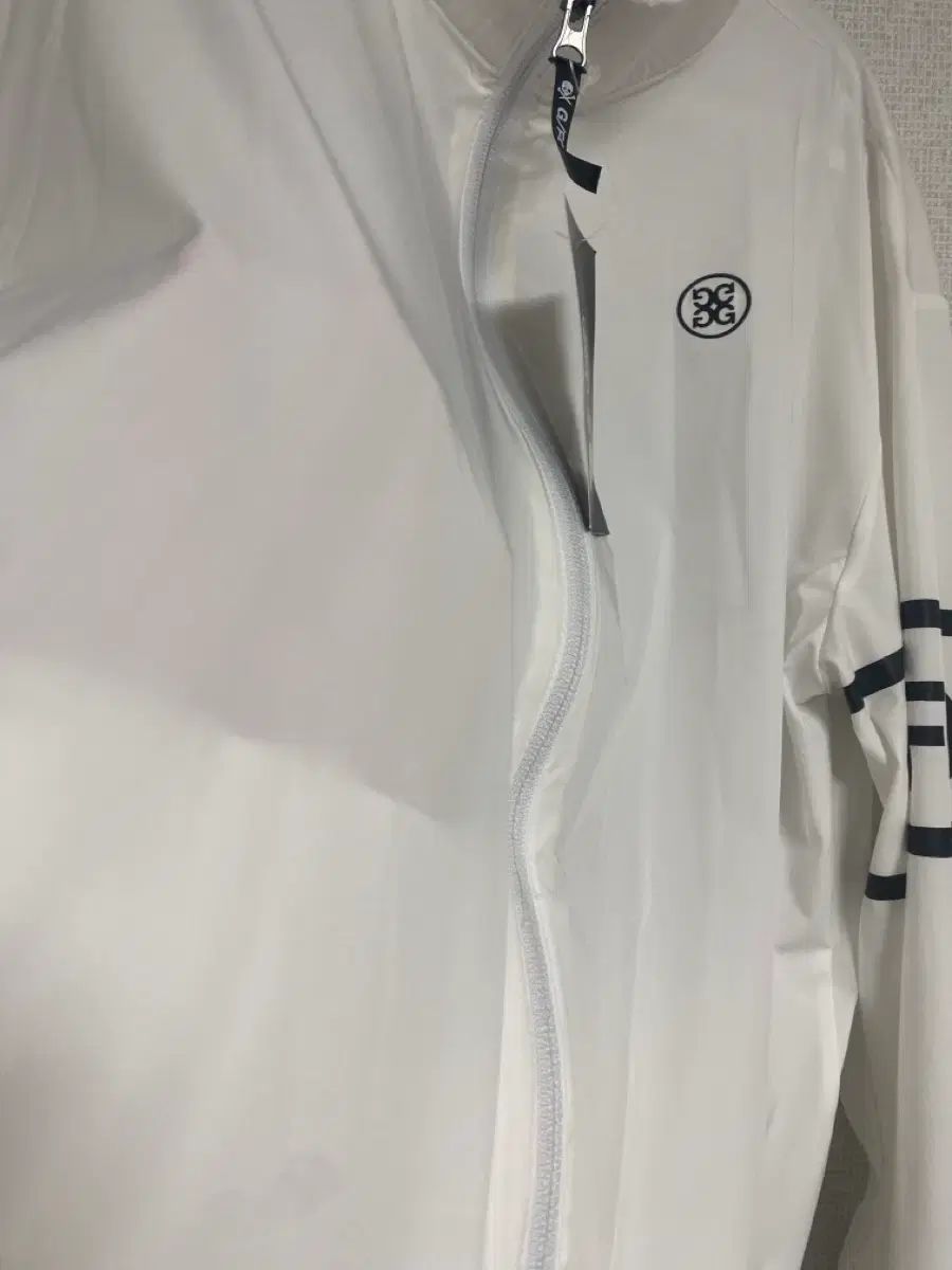 G FORE(ジーフォア) 白 ウィンドブレーカー 100 新品 - メルカリ