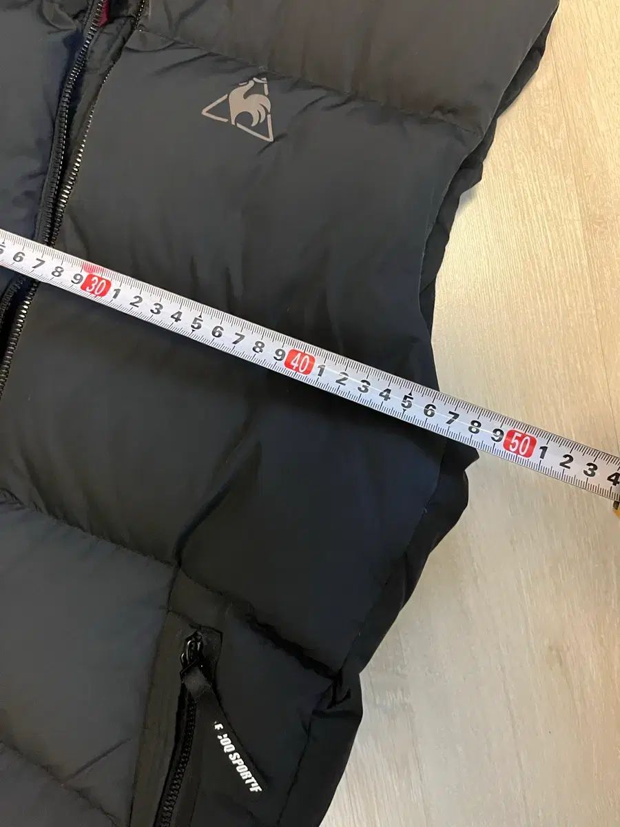 LE COQ SPORTIF ブラック ダウンベスト le coq sportif 黒 ダウン ベスト L - メルカリ