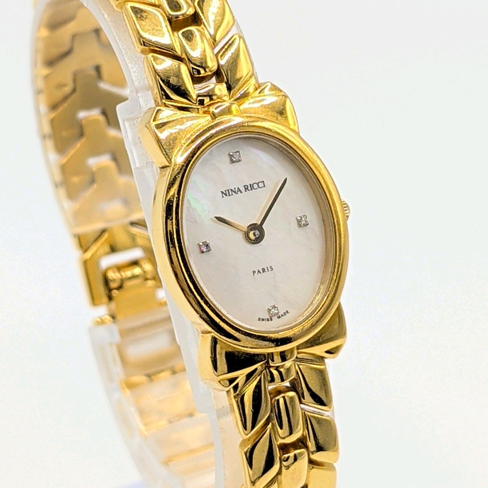 NINA RICCI Watch Quartz Round Gold Shell dial Y2K 00S Vintage Not
