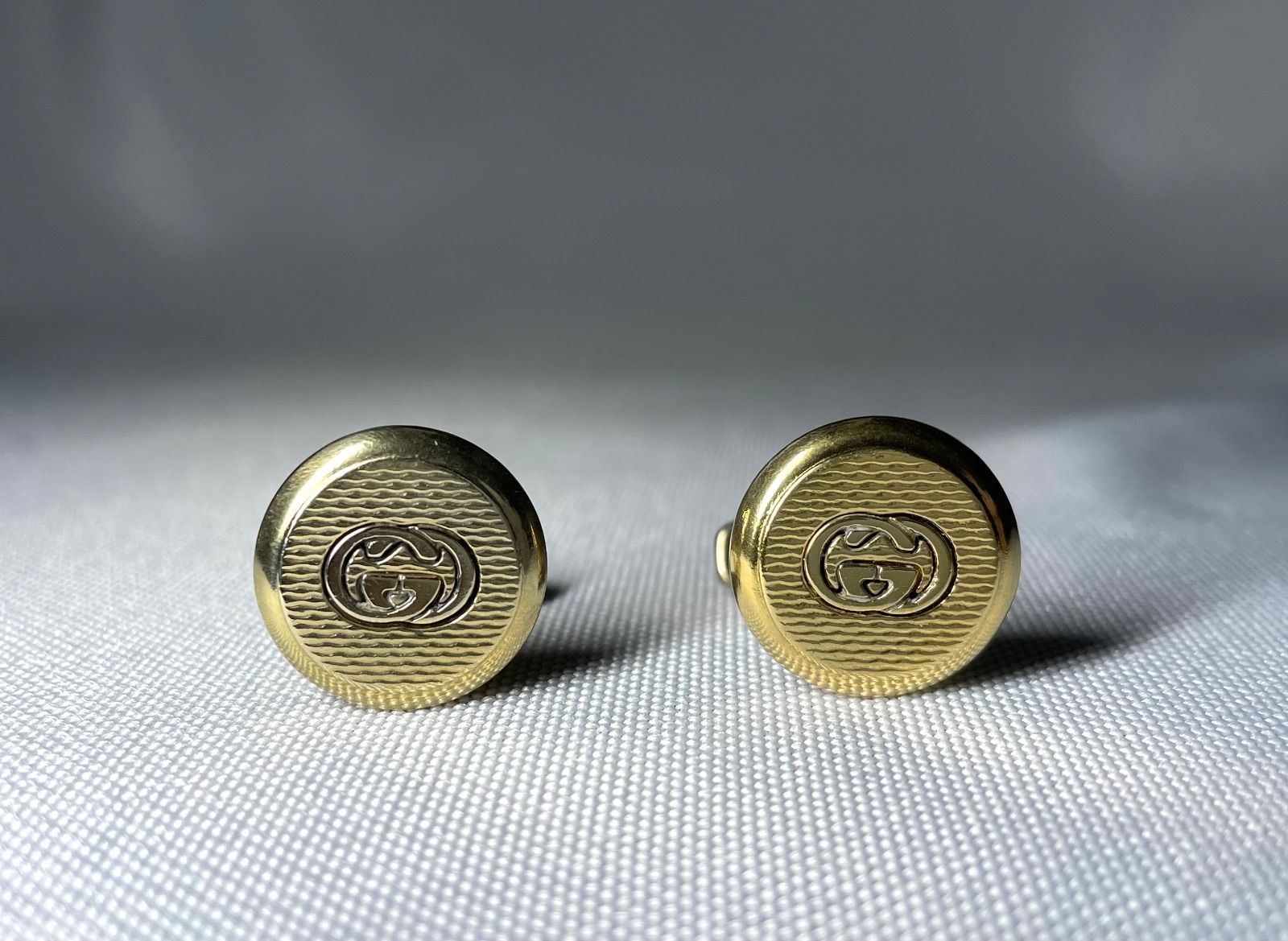 正規良 グッチ ヴィンテージ インターロッキング オーバルGGロゴカフス 金×銀 グッチ インターロッキング ヴィンテージ オーバルGGロゴカフス