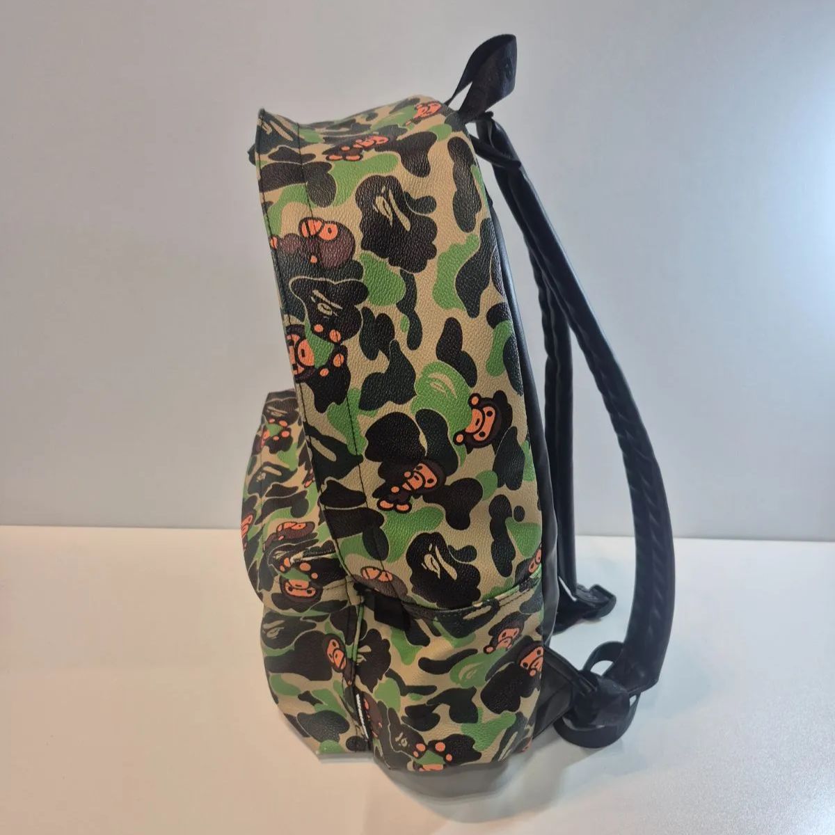 A BATHING APEBABY MILO BACKPACK迷彩リュック NEW ABC MILO ALL FRIENDS MEDIUM BACKPACK | bape.com