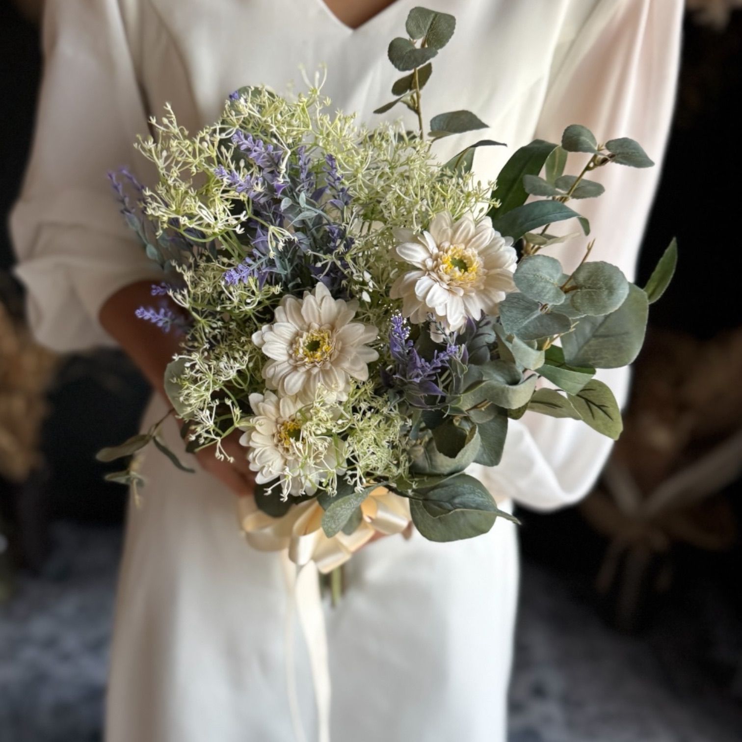 グリーンナチュラルなクラッチブーケ ブートニア