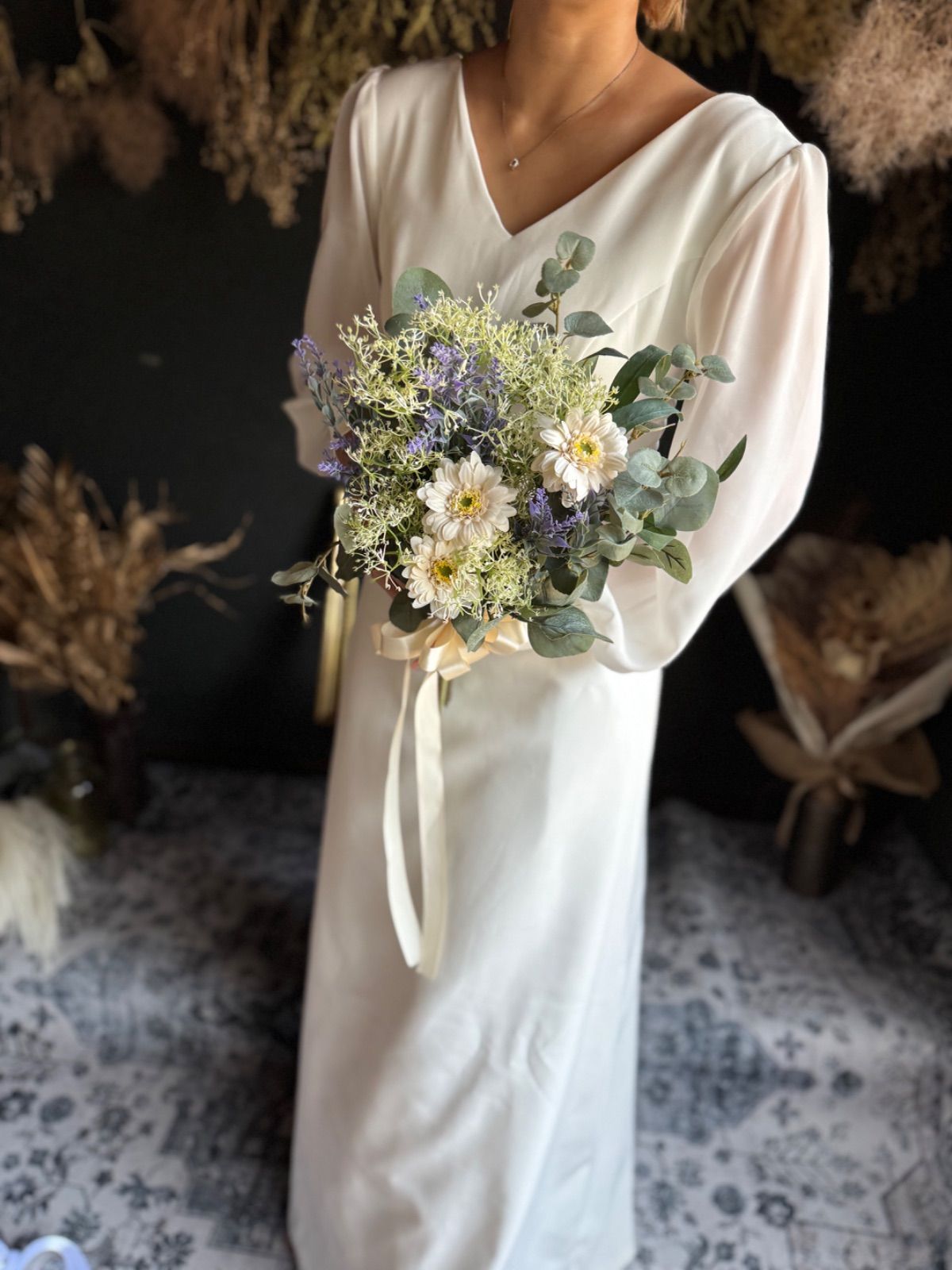 グリーンナチュラルなクラッチブーケ ブートニア