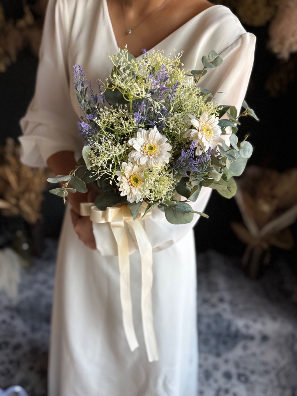 グリーンナチュラルなクラッチブーケ ブートニア