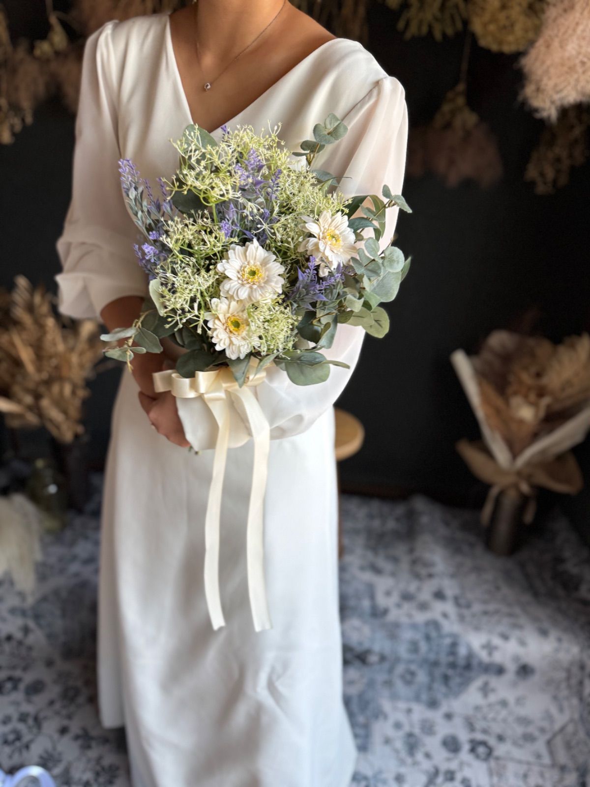 グリーンナチュラルなクラッチブーケ ブートニア