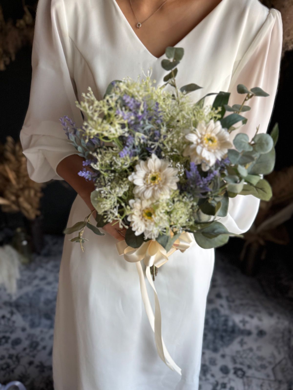 グリーンナチュラルなクラッチブーケ ブートニア