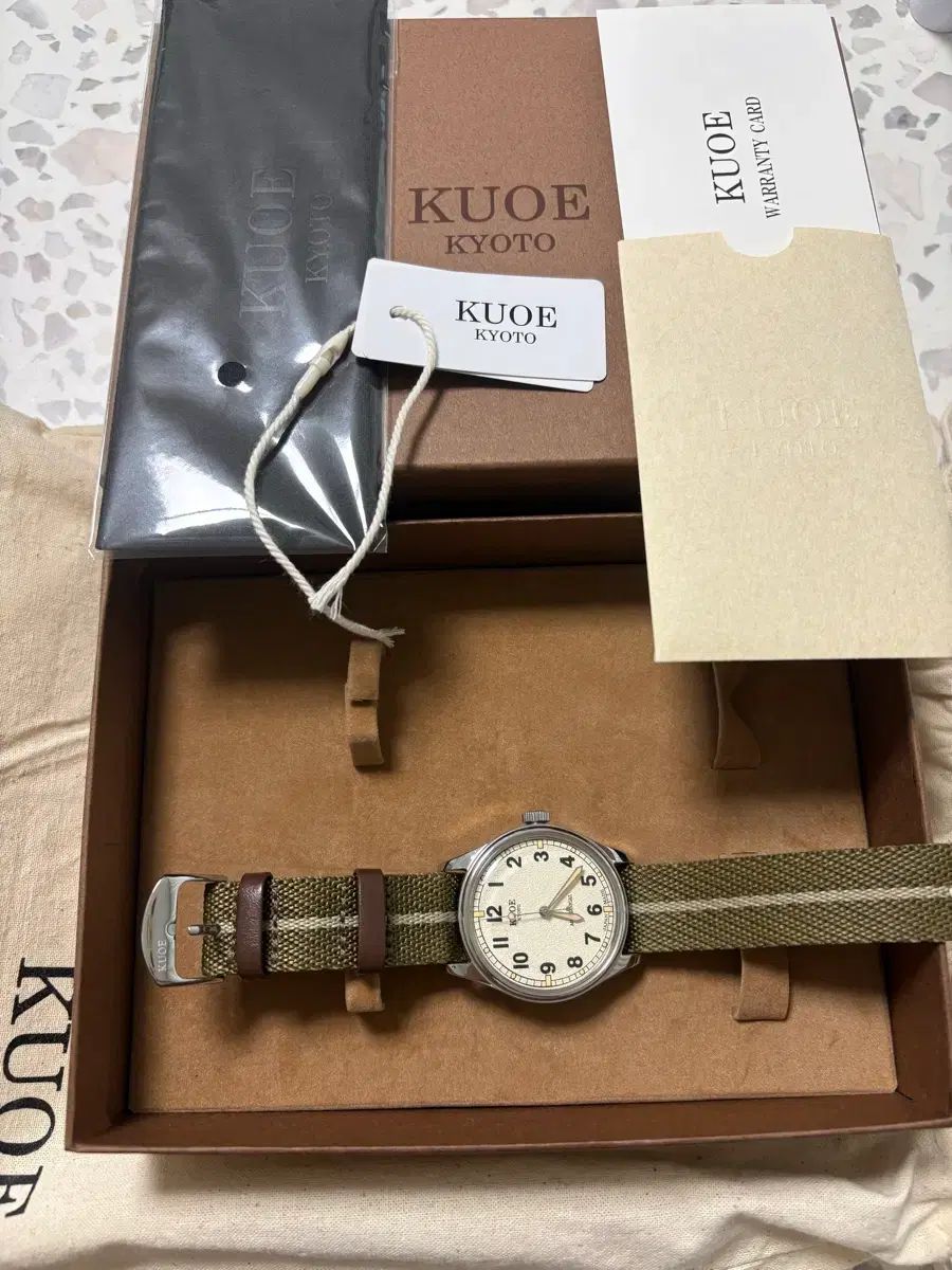 KUOE KYOTO クオキョート オールドスミス 90 002 35mm アイボリー