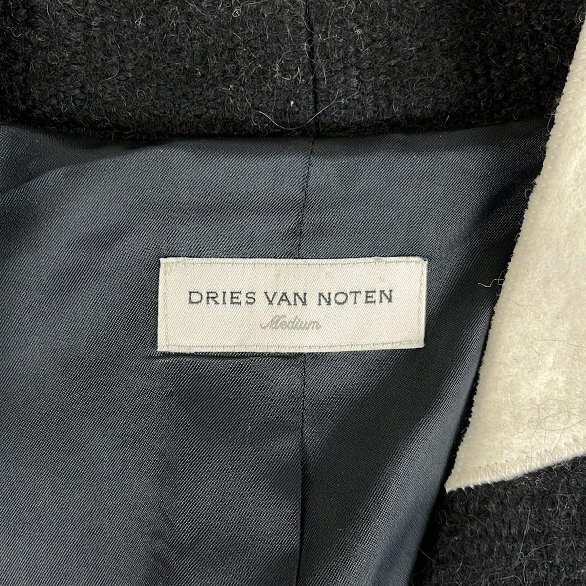 DRIES VAN NOTEN(ドリスヴァンノッテン) ポンチョ レディース - 黒×白