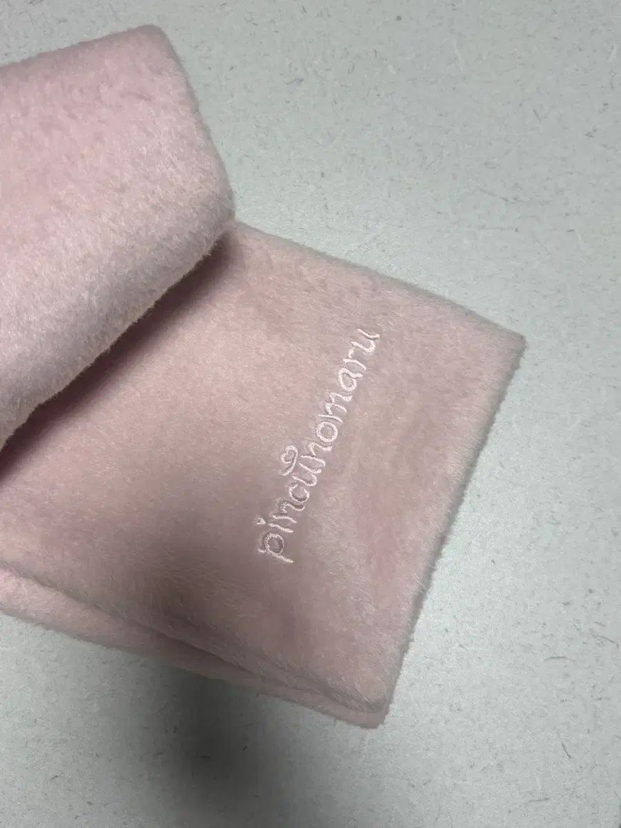 ピンクマルのリボンベビーピンクのマフラー