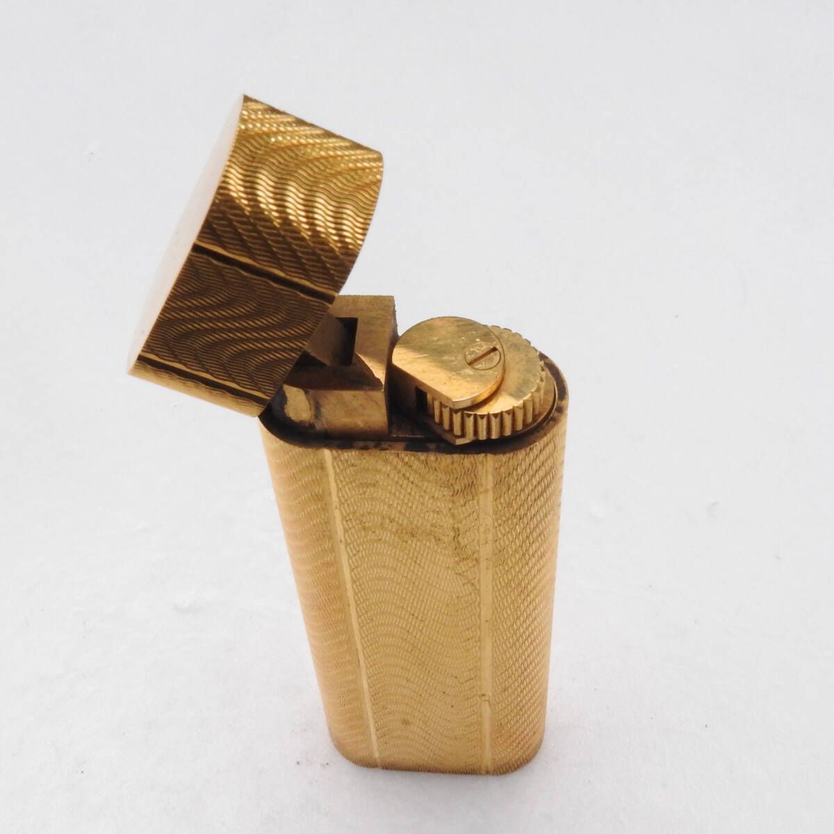 着火未確認】Cartier カルティエ ゴールド 柄物 ガスライター - メルカリ