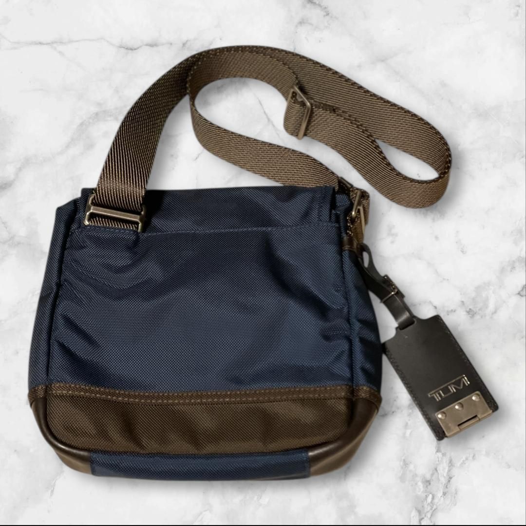 TUMI ショルダーバッグ ネイビー×ブラウン 斜め掛け 正規品 - メルカリ