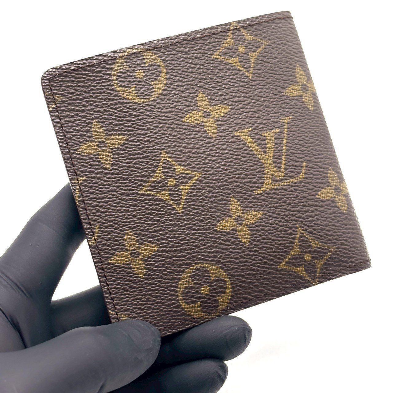 評価は重く LOUIS