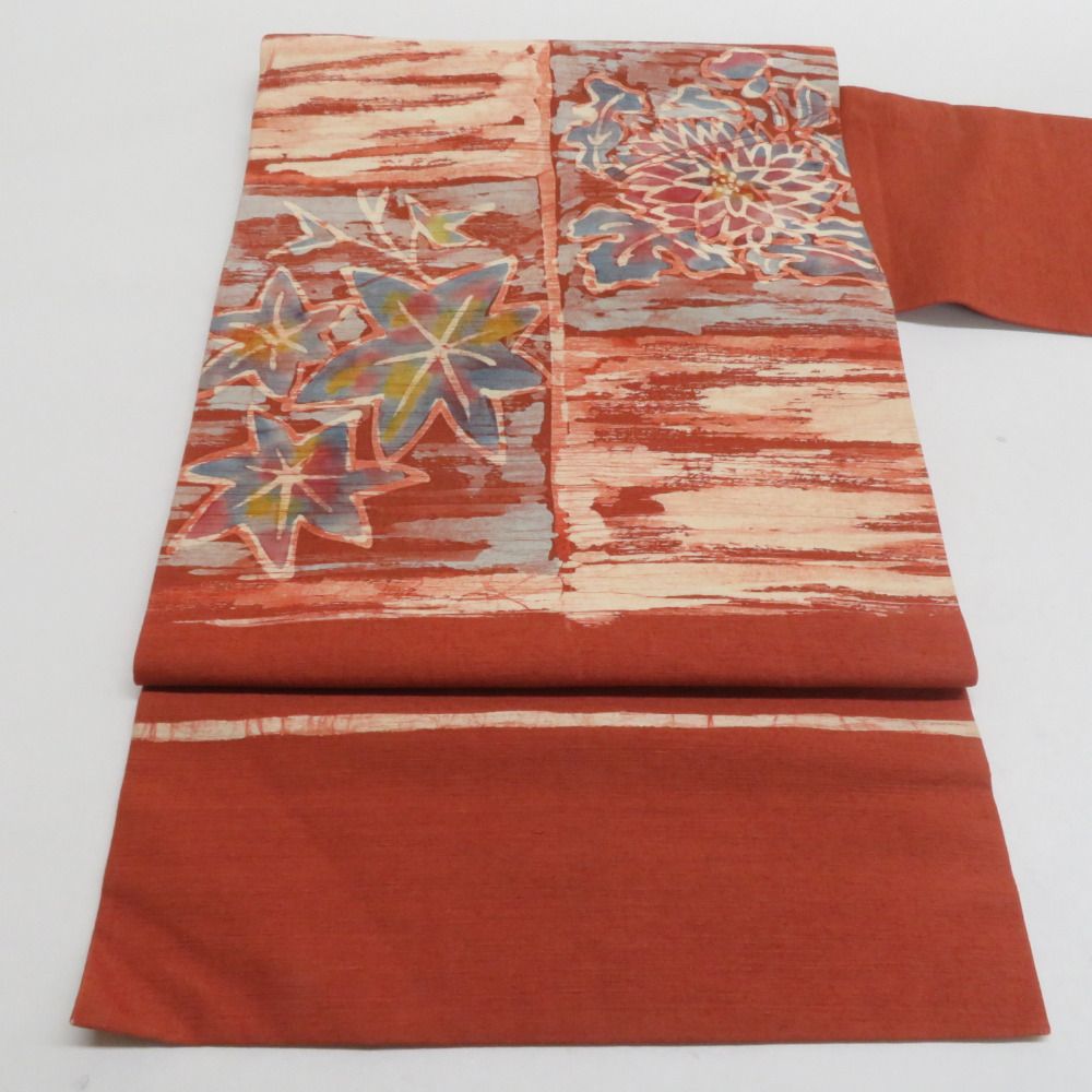 名古屋帯 紬地 ろうけつ染め 菊に紅葉文様 茶色 正絹 お太鼓柄 九寸帯