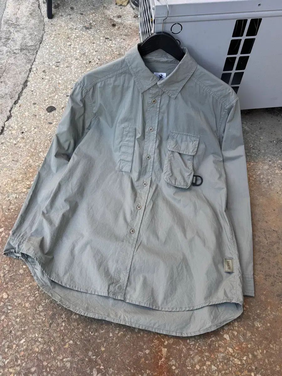 ISSEY MIYAKE by ハイ スポーティング ギア ユーティリティ シャツ