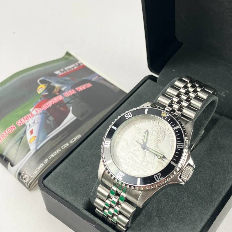 稼働品 電池交換済み F 1 アイルトンセナ 記念腕時計 アナログ シルバー文字盤 ベゼル 金属ベルト シルバー