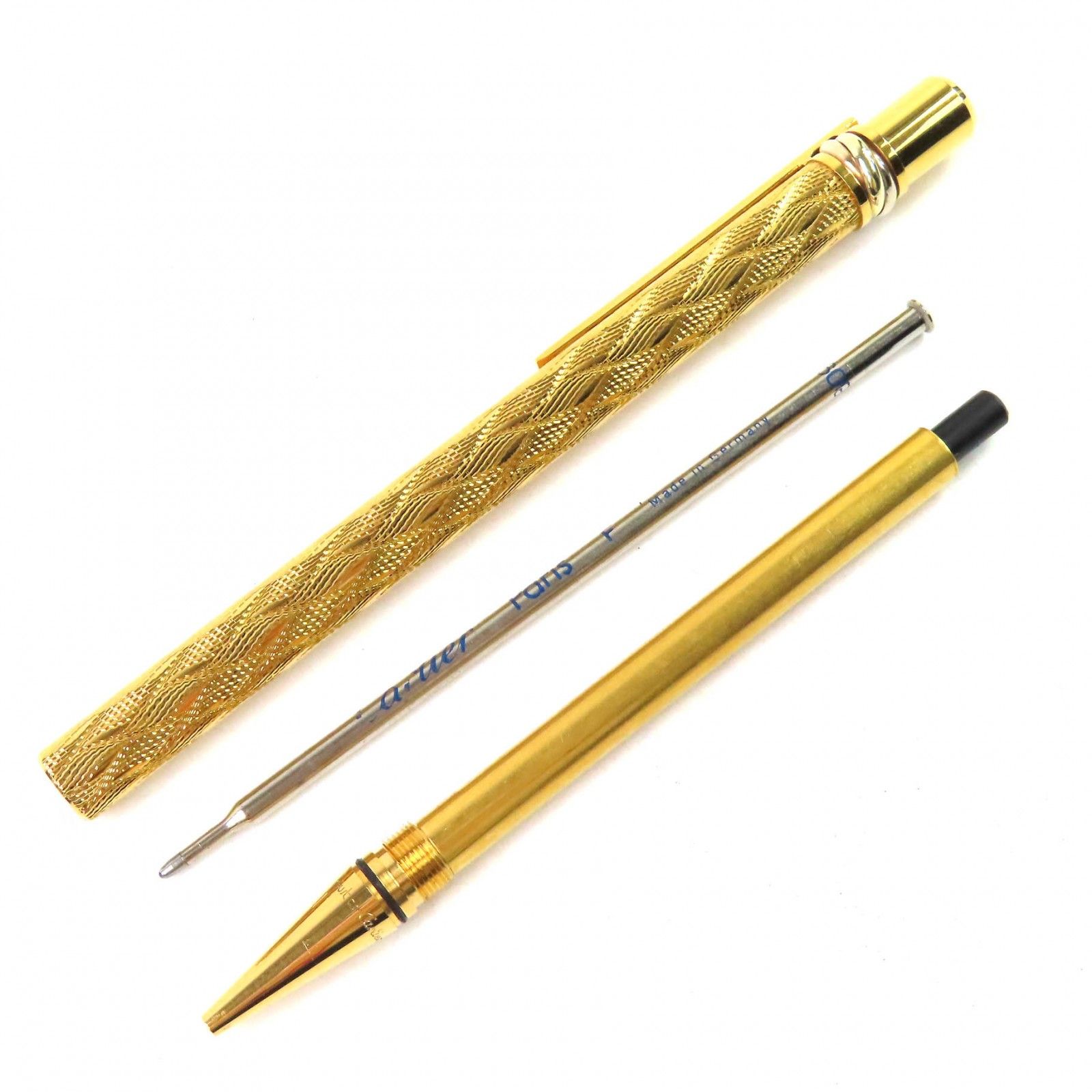 △Cartier カルティエ マスト ドゥ トリニティ ウェーブ柄 ツイスト式 ボールペン ゴールド メンズ 筆記 済み