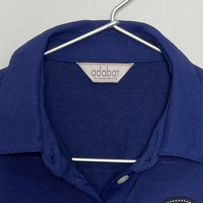 adabat アダバット ポロシャツ ゴルフウェア 刺繍ロゴ ワッペン 半袖シャツ ポリエステル/コットン ネイビー【中古】 レディース adabat アダバット ポロシャツ ゴルフウェア 刺繍ロゴ ワッペン 半袖
