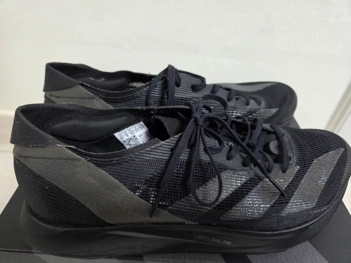 アディダス タクミ セン 10 265