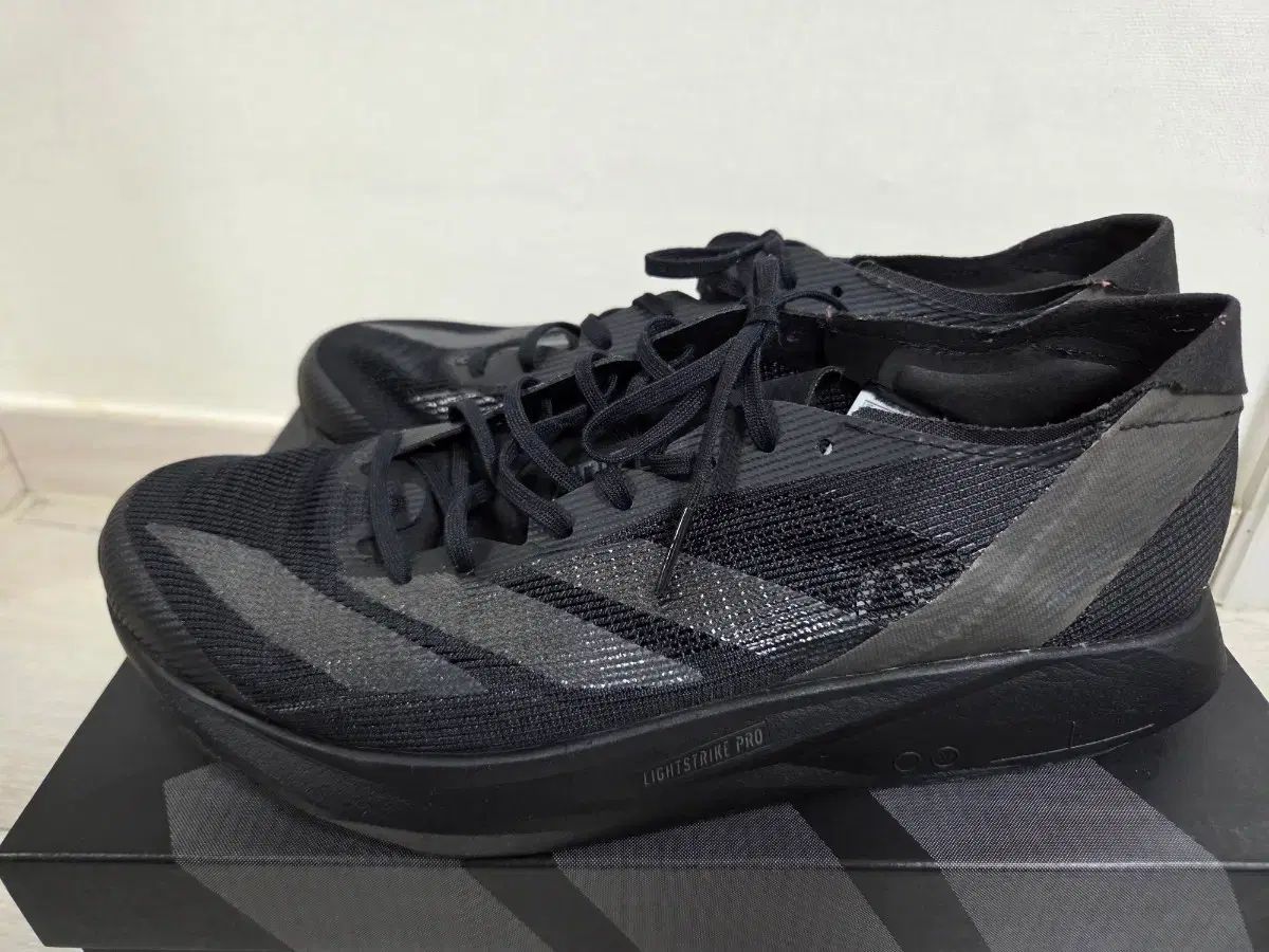 アディダス タクミ セン 10 265