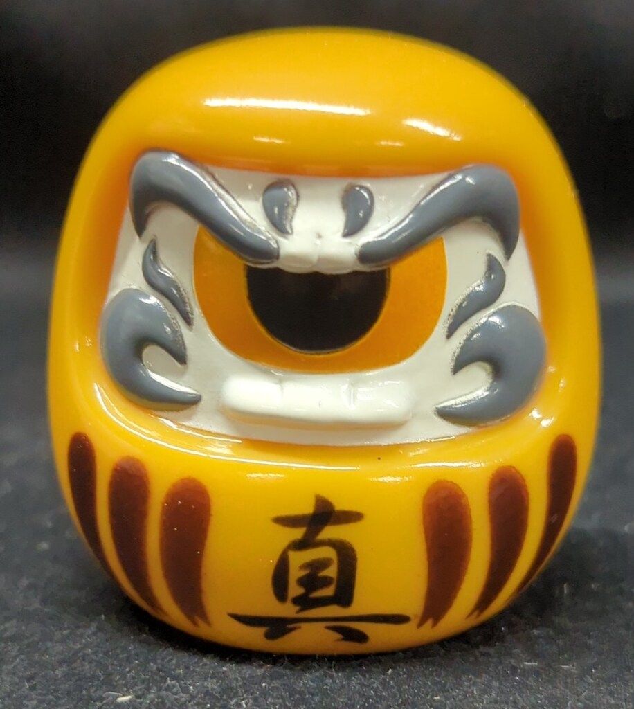 REALHEAD フォーチュンだるま 黄土色成型/顔白/黒黄色目/茶/黒文字/真