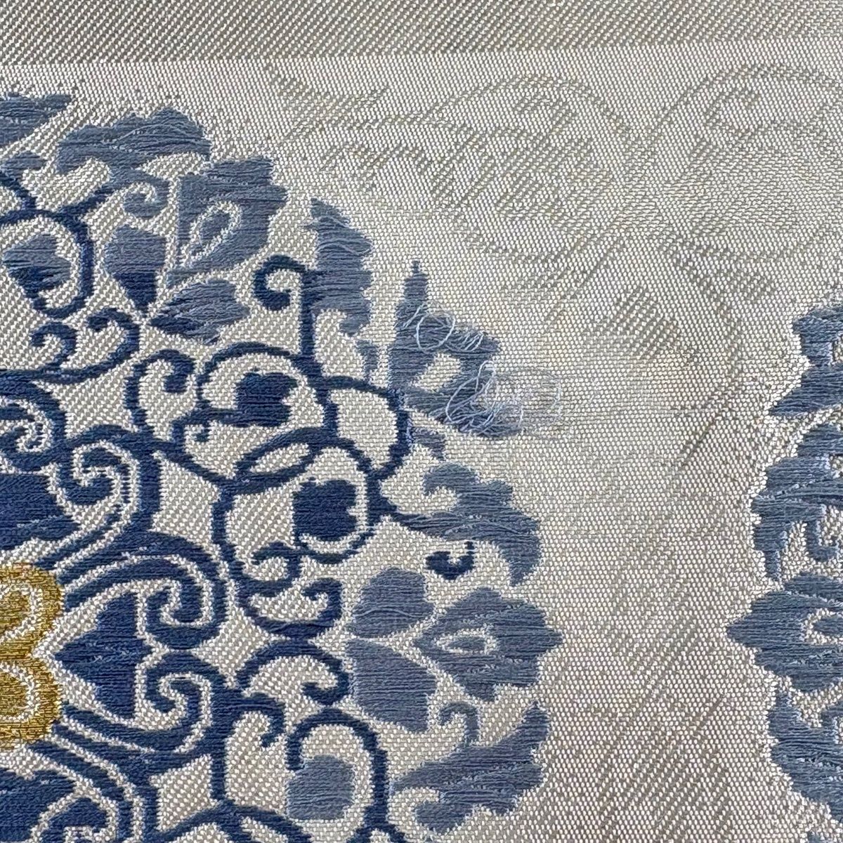 名古屋帯 秀品 関西仕立て 華文 花唐草 金糸 箔 クリーム 正絹 【中古