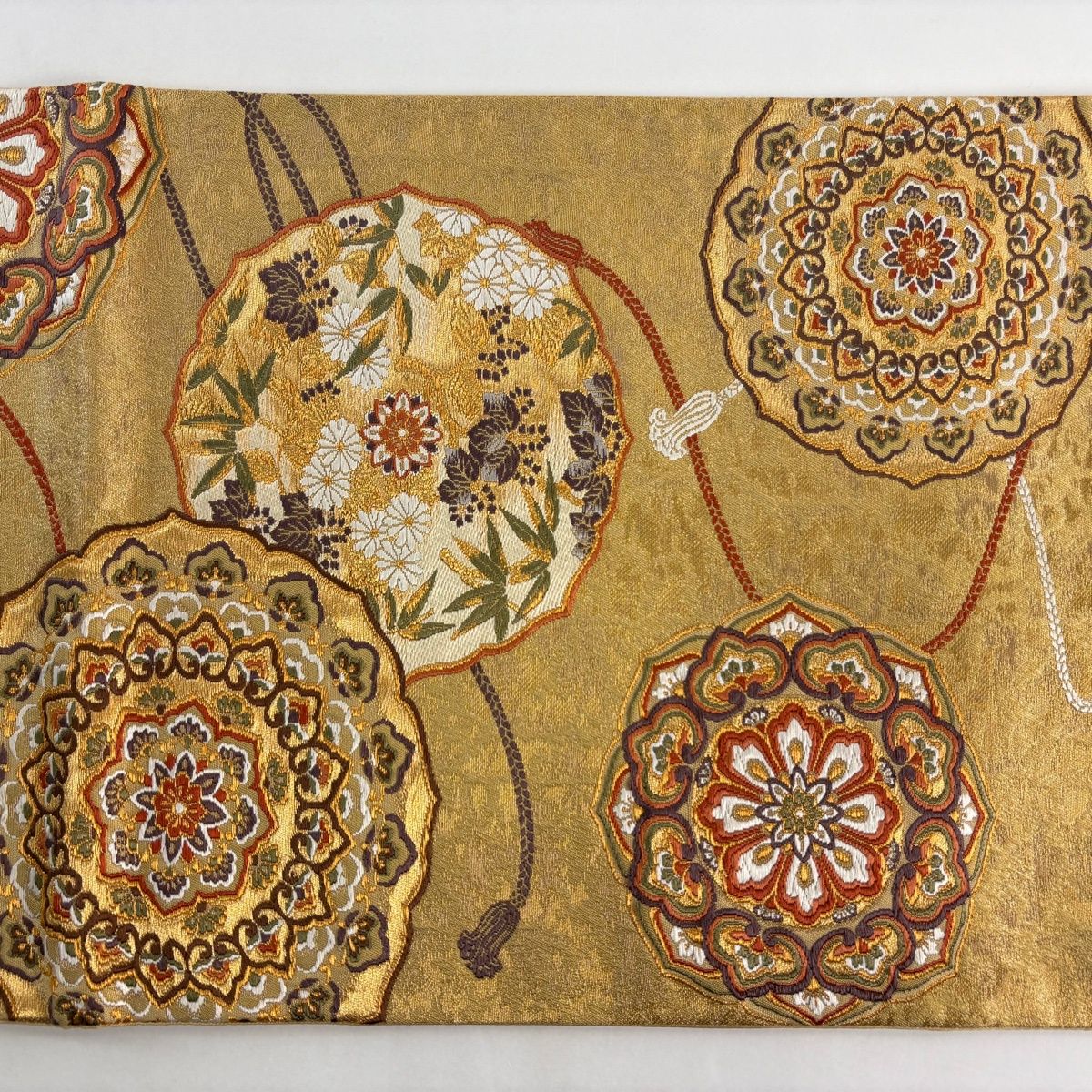 袋帯 美品 逸品 引箔本金紹巴 菱重ね鏡文 金糸 金色 お太鼓柄 正絹 袋帯 名品 幾何学模様 縞 金糸 箔 紫 お太鼓柄 正絹 中古 : リユース