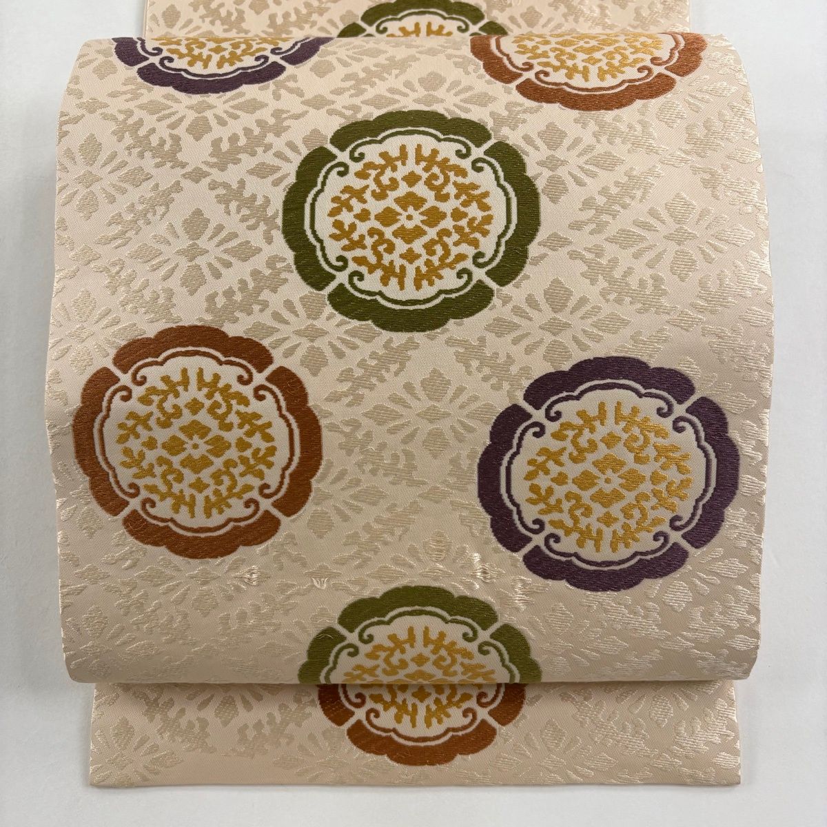 開き名古屋帯 人間国宝 喜多川平朗 華文 花菱 唐織 薄オレンジ 正絹