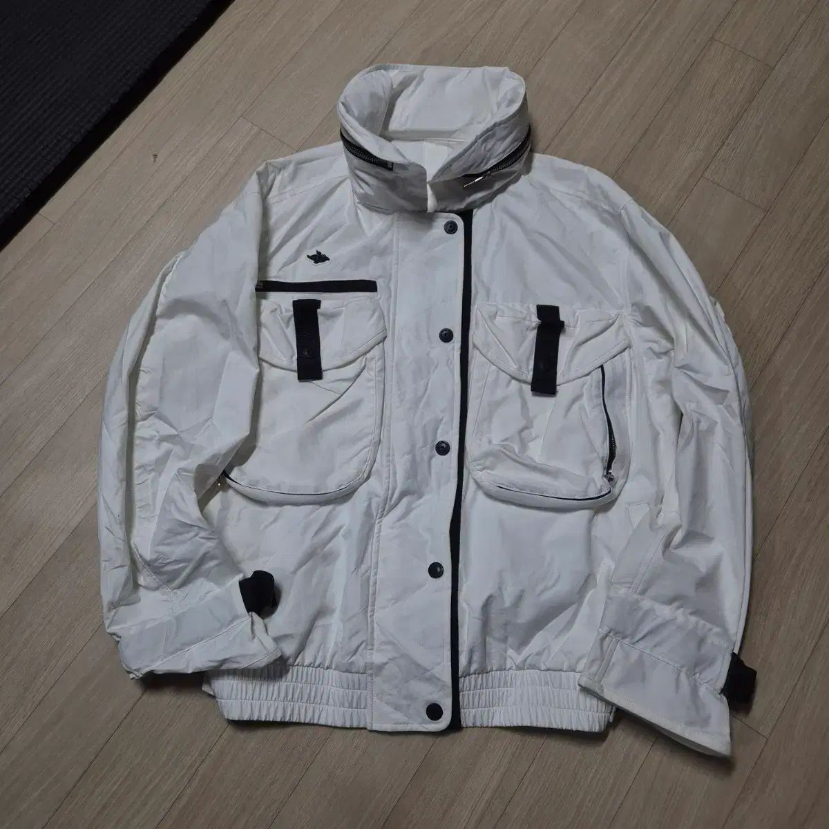 パーリーゲイツ 白 ポケット ポイント フーディー ウィンドブレーカー アウター