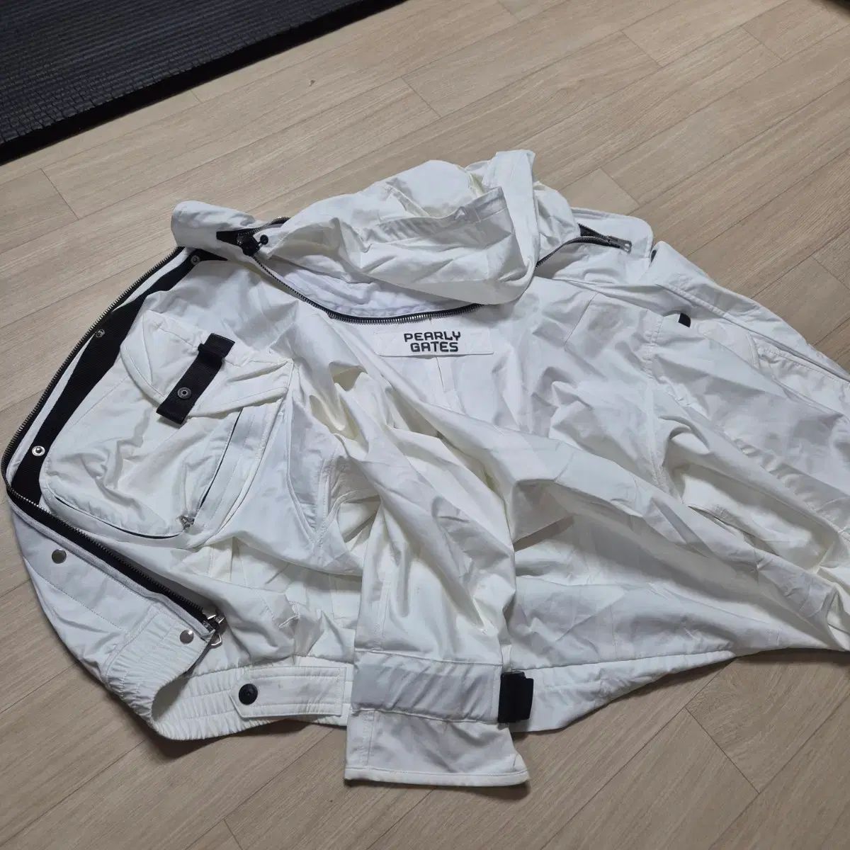 パーリーゲイツ 白 ポケット ポイント フーディー ウィンドブレーカー
