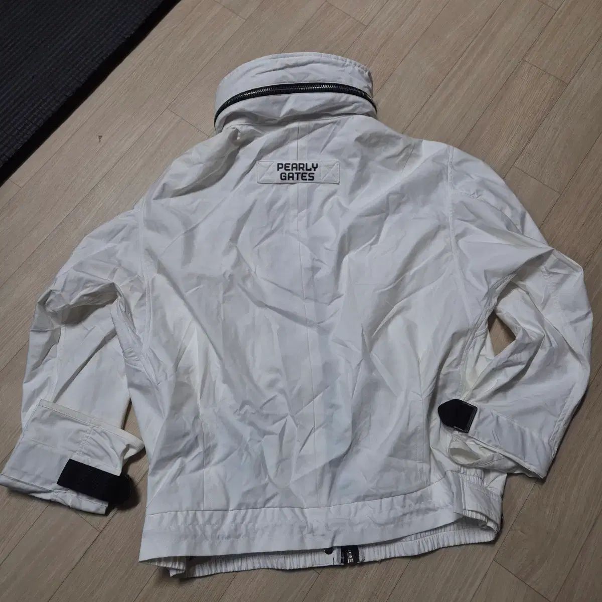 パーリーゲイツ 白 ポケット ポイント フーディー ウィンドブレーカー アウター