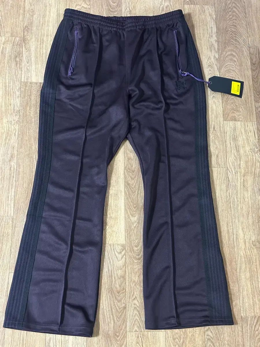 ニードルズ ブーツカット トラック パンツ ポリ スムース ダーク パープル