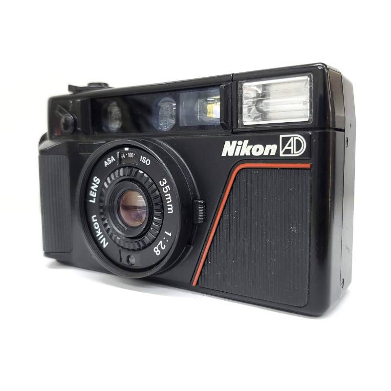 Nikon L 35 AD F 1211 57 6 p