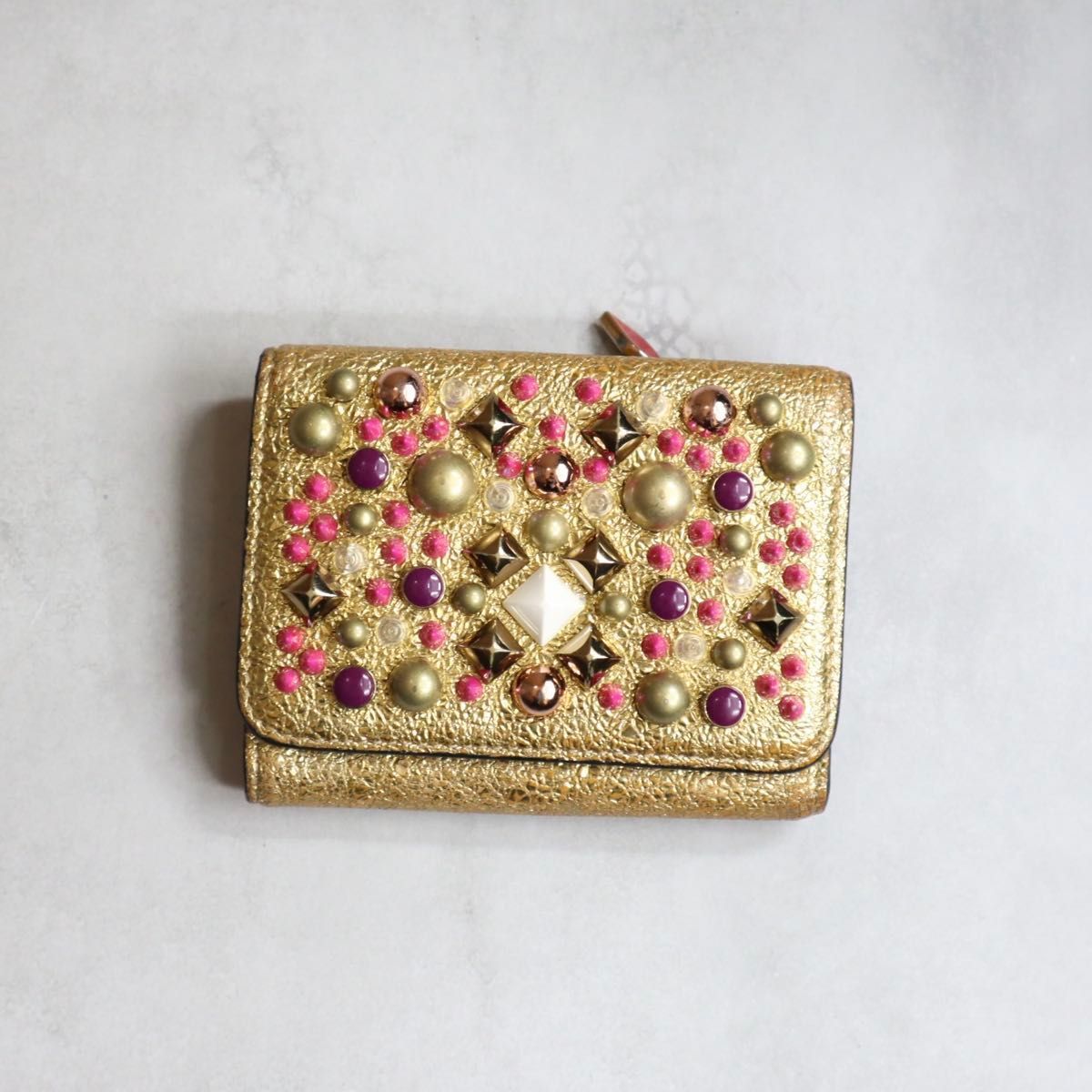 Christian Louboutin クリスチャンルブタン | マカロンミニウォレット 三つ折り財布 ゴールド レッド スタッズ MACARON MINI WALLET