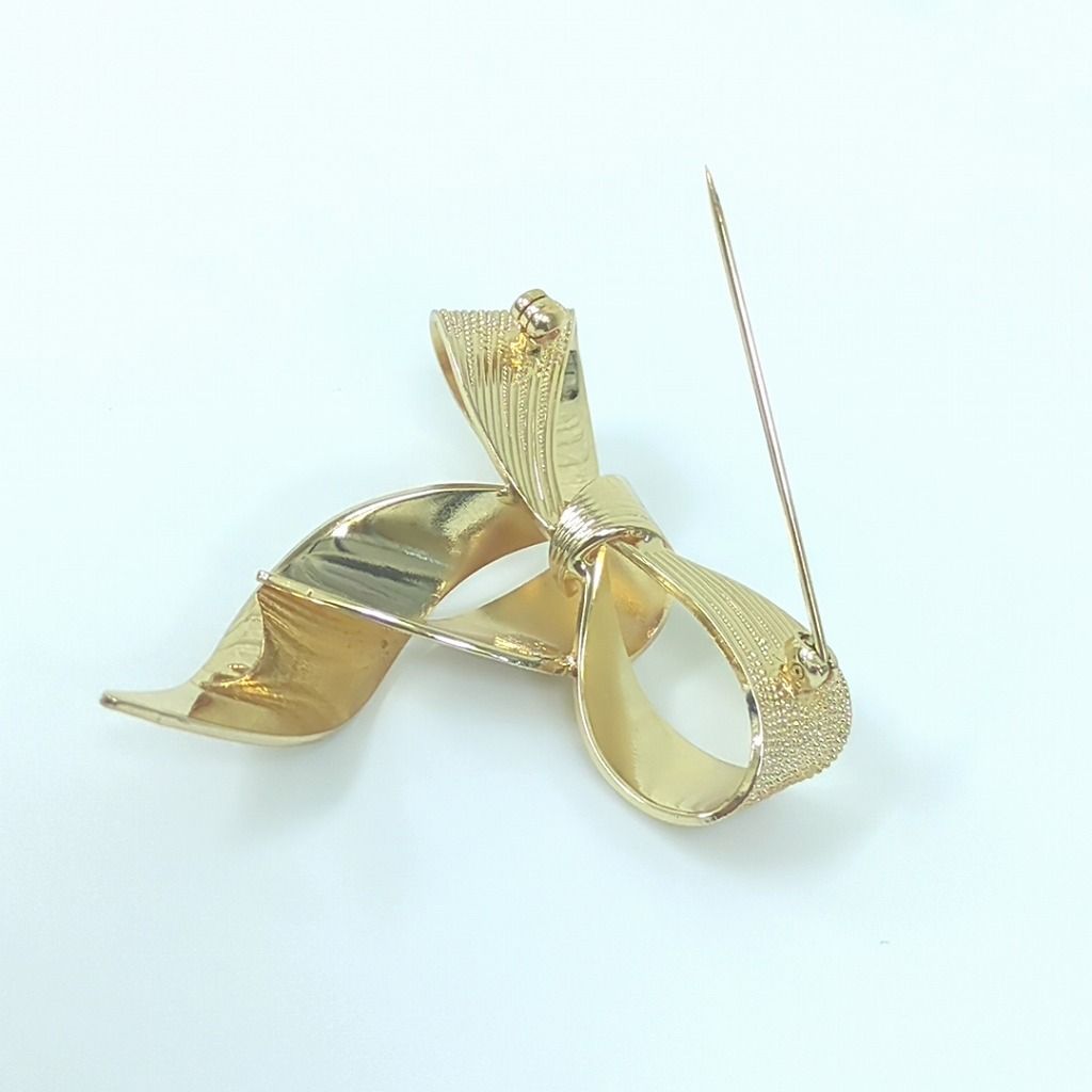 クリスチャン ディオール ゴールドトーン リボン ブローチ - メルカリ