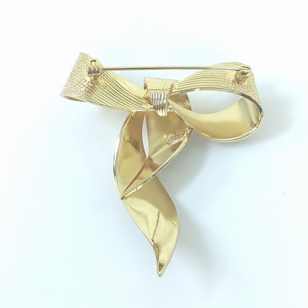 クリスチャン ディオール ゴールドトーン リボン ブローチ - メルカリ