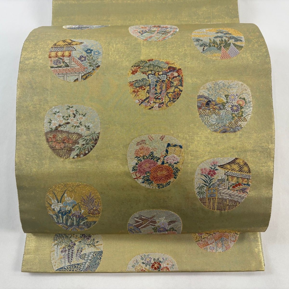 袋帯 名品 長嶋成織物 落款 桃山丸紋 瀞金錦 関西仕立て 御所車 金糸 箔 金色 お太鼓柄 正絹