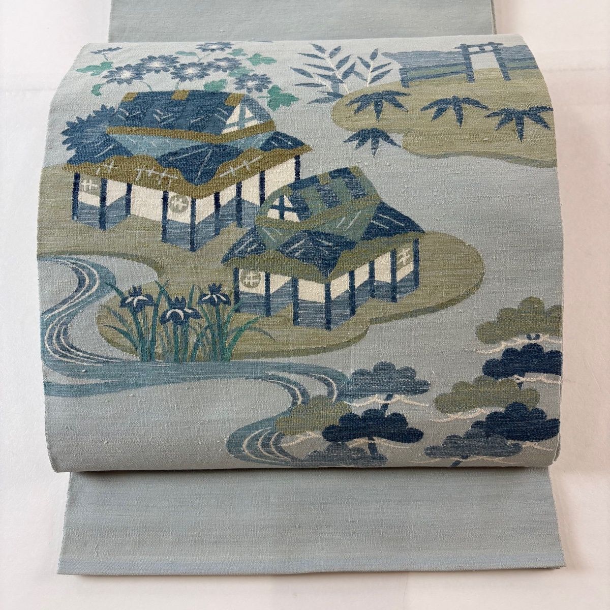 袋帯 名品 川島織物 落款 紬地 家屋 流水 水色 お太鼓柄 正絹