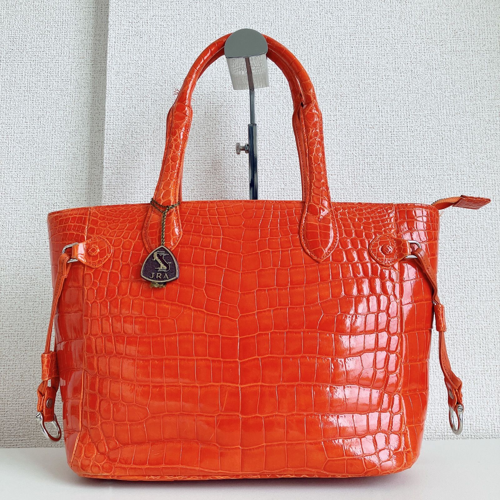 クロコダイル型押し オレンジ トートバッグ - メルカリ