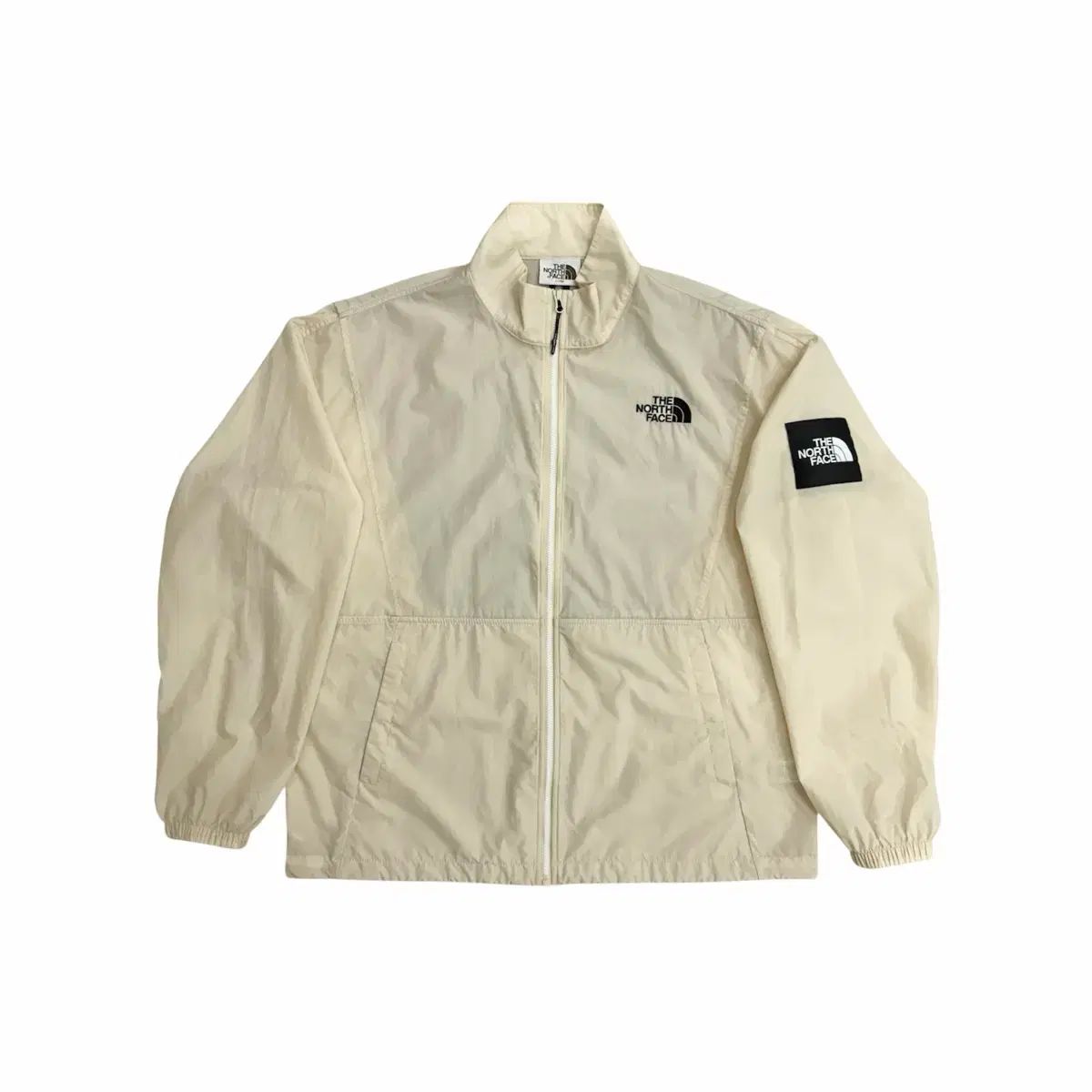 THE NORTH FACE ザノースフェイス 白ラベル アイボリー 軽量 ウィンドブレーカー ジャケット 100 L