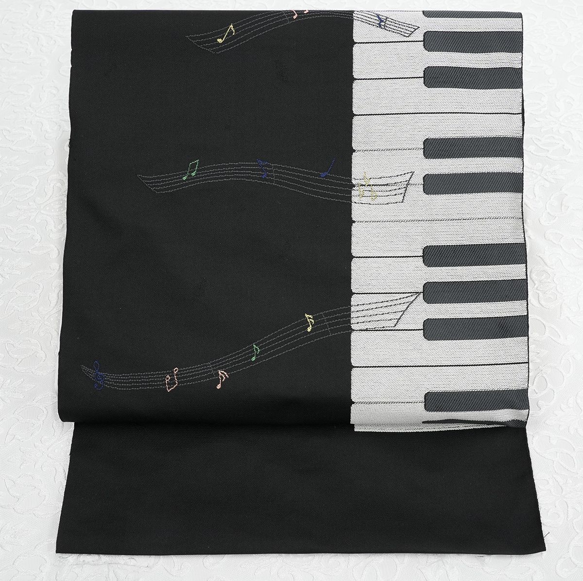 未仕立 西陣織 九寸 名古屋帯 ピアノ 鍵盤 音符 黒地 仕立代込み