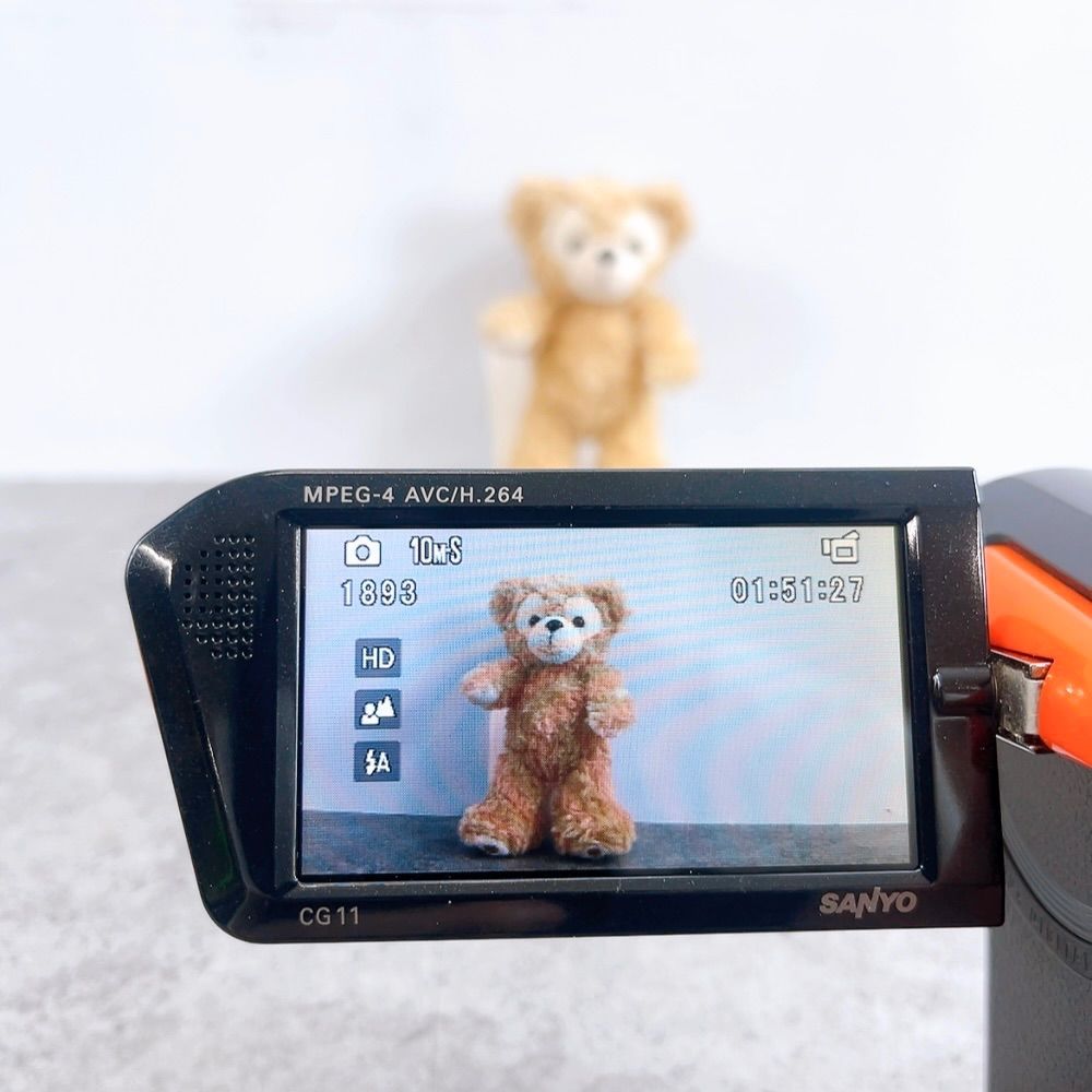 H-452 SANYO デジタルムービーカメラ Xacti DMX-CG 11 オレンジ 動作品 10メガピクセル フルHD対応 防水デザイン コンパクトビデオカメラ